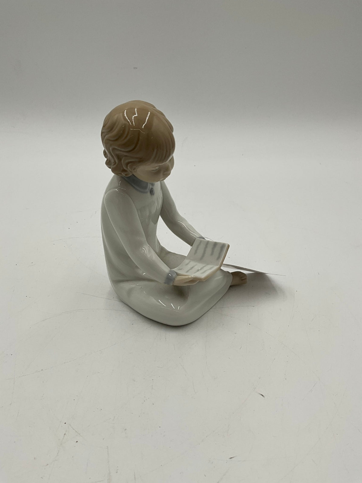 Lladro - Boy Reading