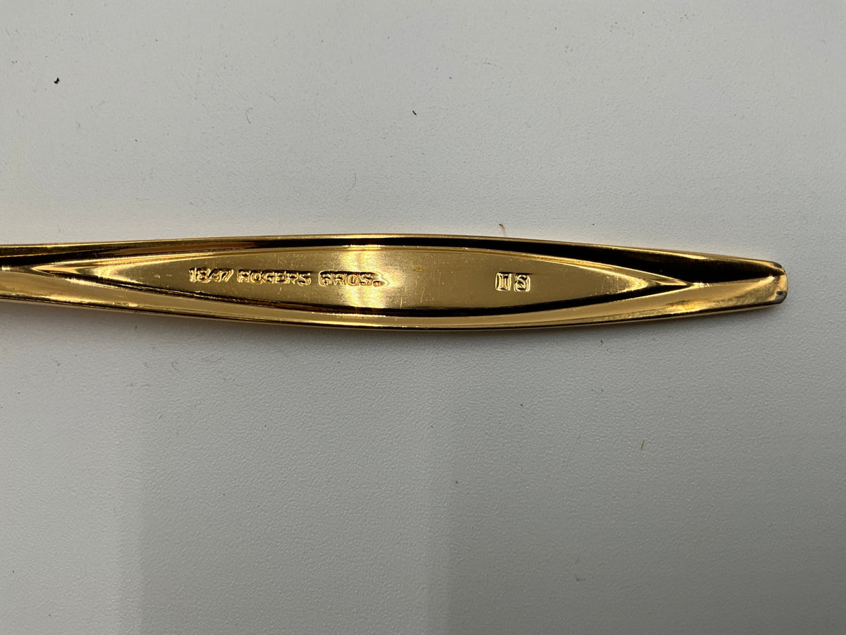 W.M. Rogers Gold Silverware Service for 6 & Extras