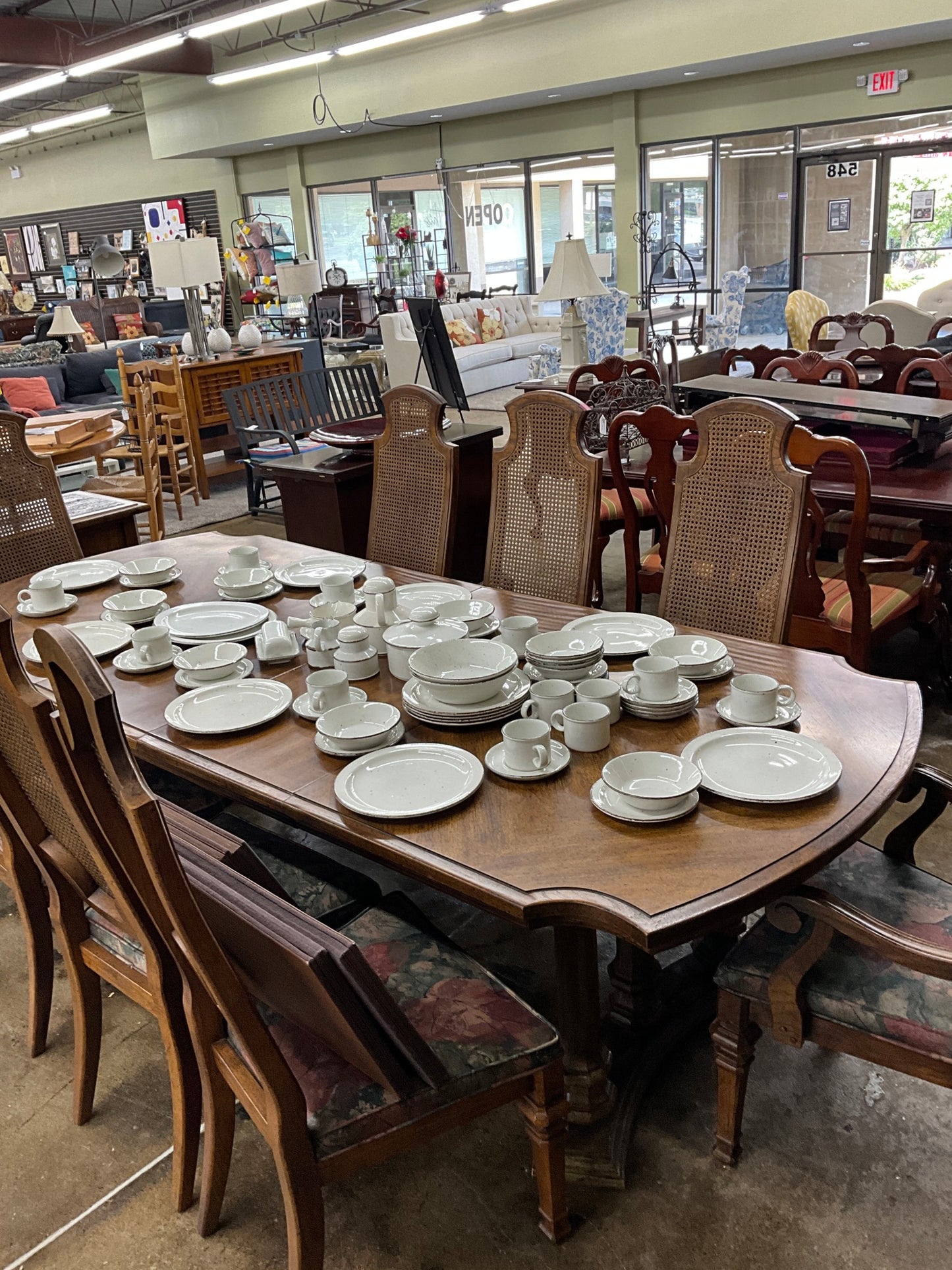 Table w/ 8 Cane-back Chairs