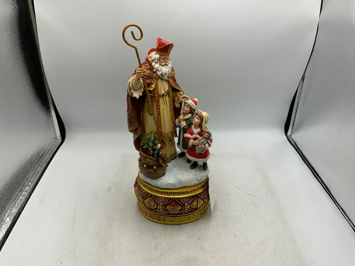 Santa & Children Statue