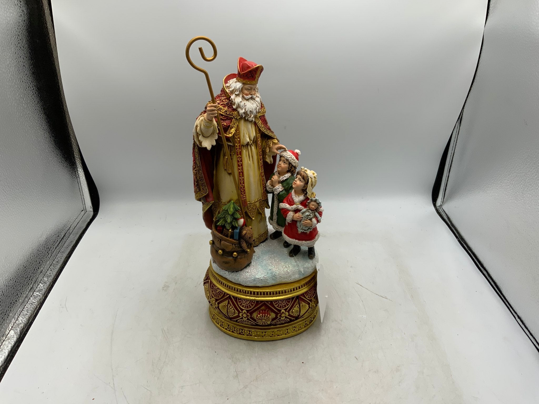 Santa & Children Statue