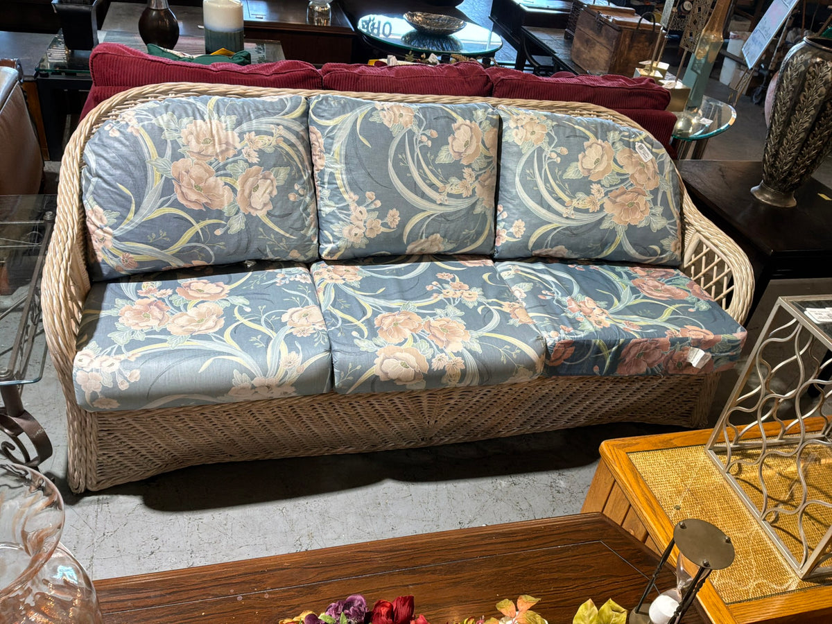 Cream Wicker Couch W/ Floral Cushions