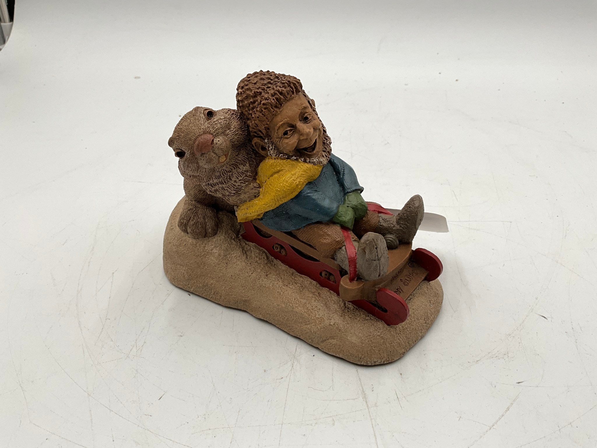 Tom Clark & Tim Wolf Gnome On Sled
