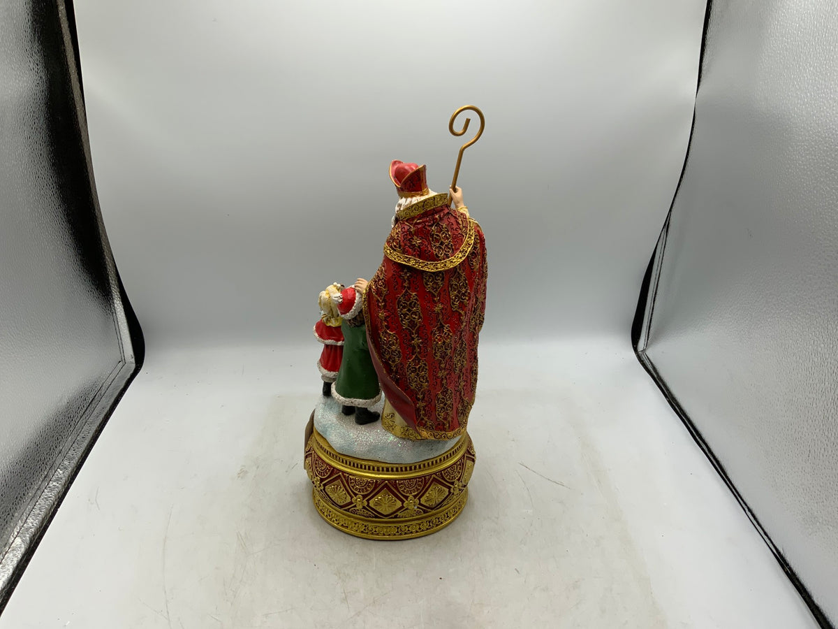 Santa & Children Statue