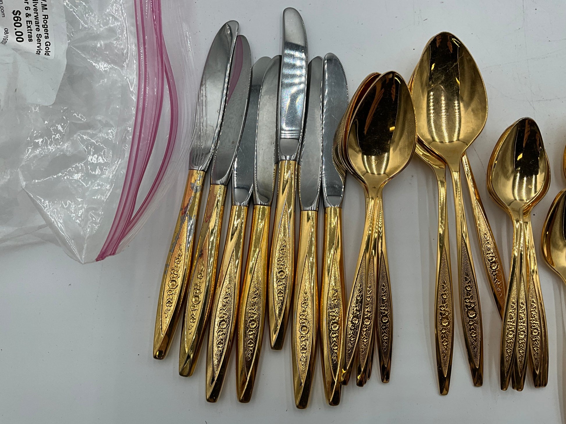 W.M. Rogers Gold Silverware Service for 6 & Extras