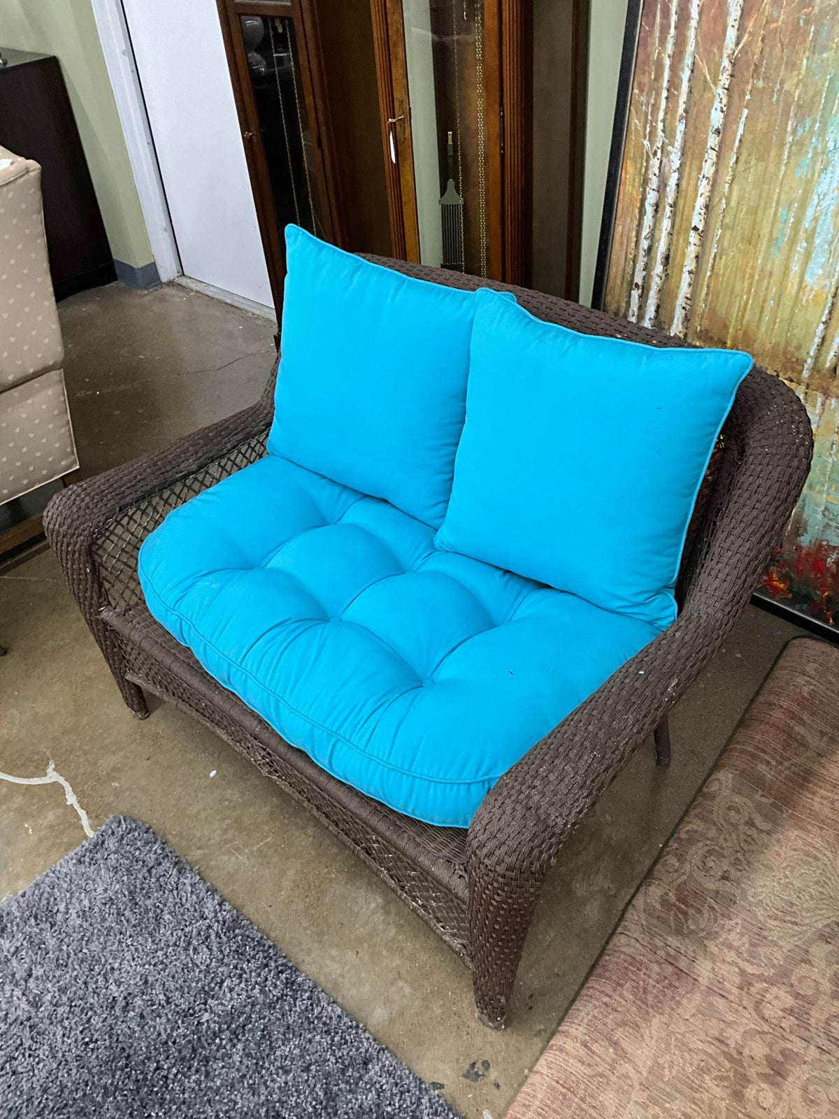 Wicker Sofa w/ Blue Cushion & 2 Pillows