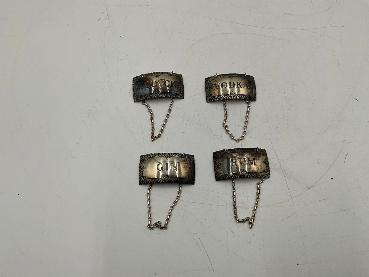 Set of 4 Stieff Sterling Bottle Huggers