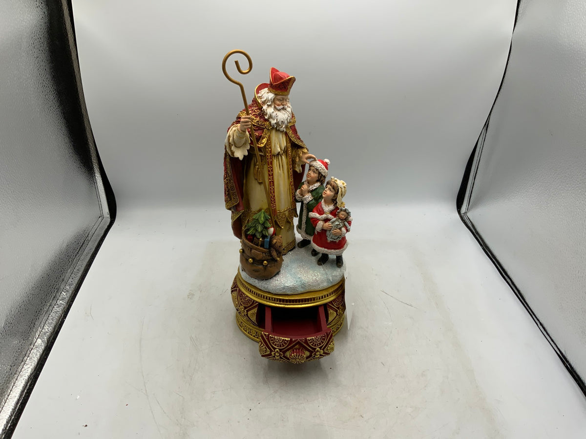 Santa & Children Statue