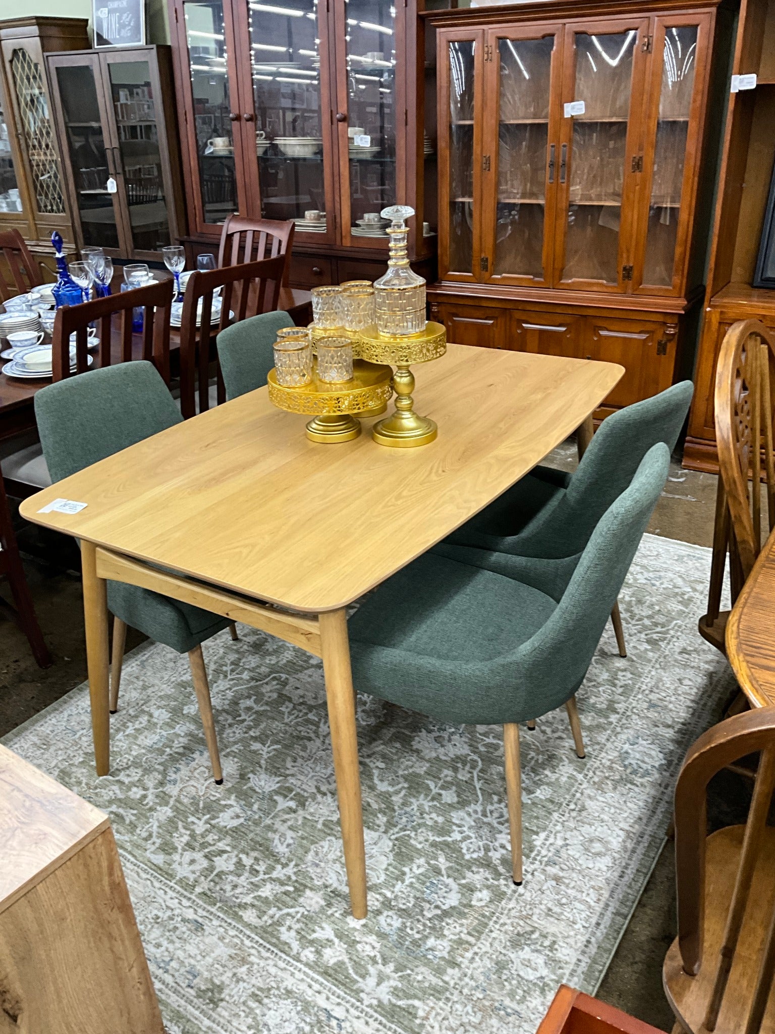 Light Wood Table w/ 4 Green Upholstered Chairs